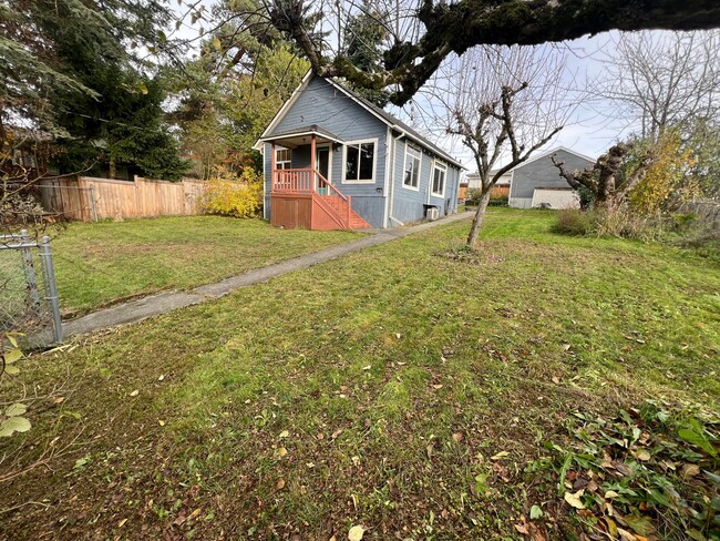 Building Photo - 2BDR House With HUGE Backyard ~ Centrally ...