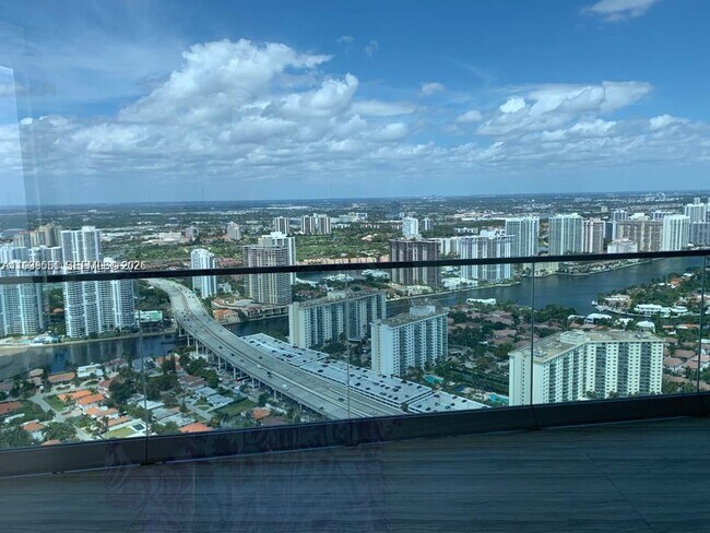 Building Photo - 18975 Collins Ave