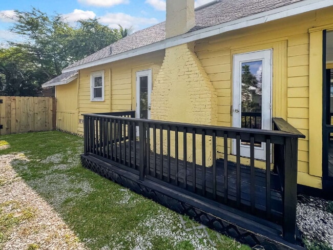 Building Photo - Deck the halls or the French doors, becaus...