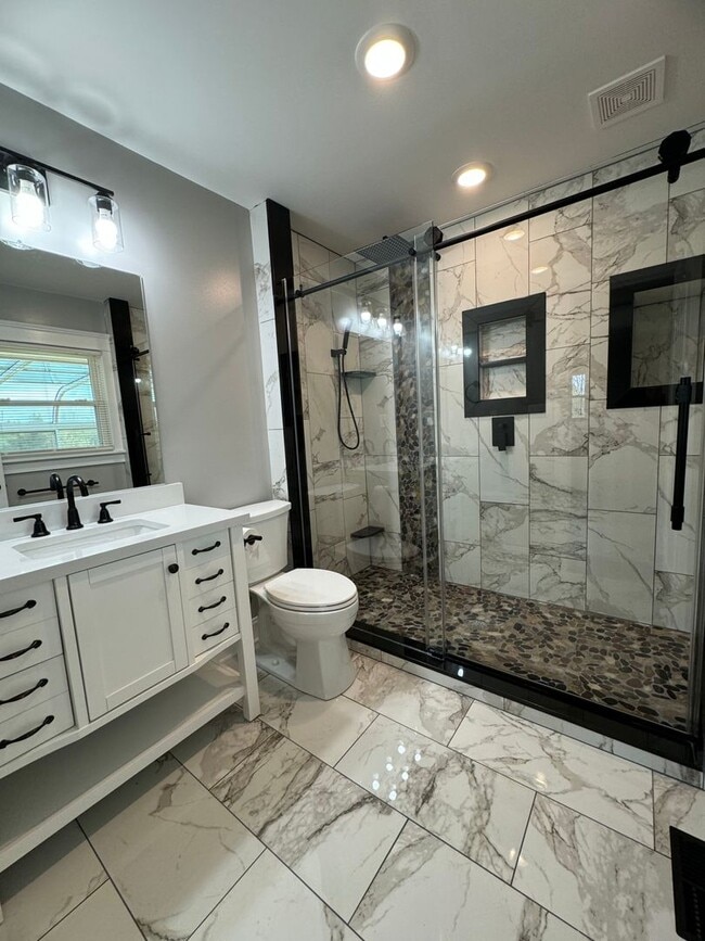 Building Photo - Exquisite Brick Ranch with Modern Upgrades, Countryside Charm And Two Car Garage