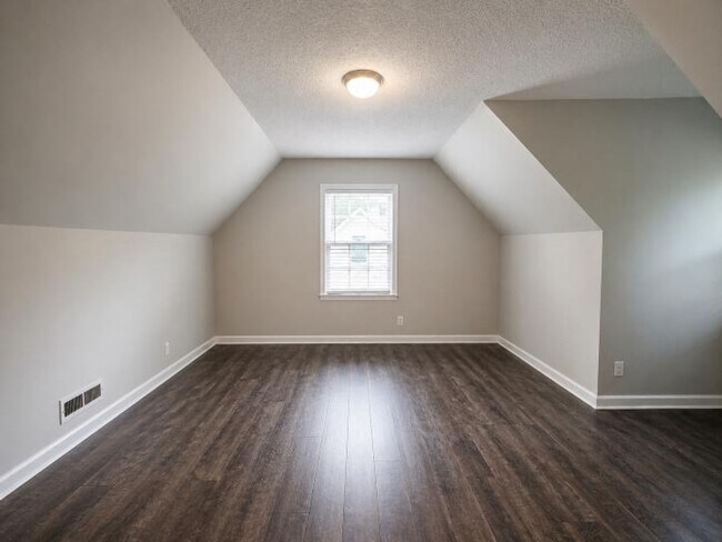 Building Photo - Welcome home to the perfect blend of peaceful country charm and modern city living!