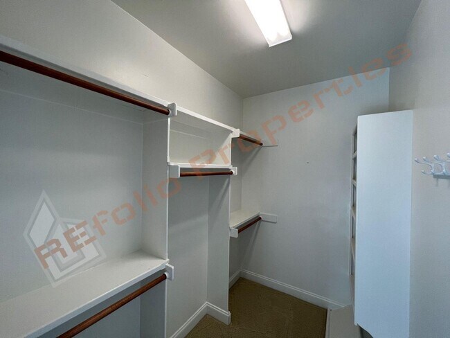 Building Photo - Elegant 3 Story 3 Bedroom Formal Model Tow...