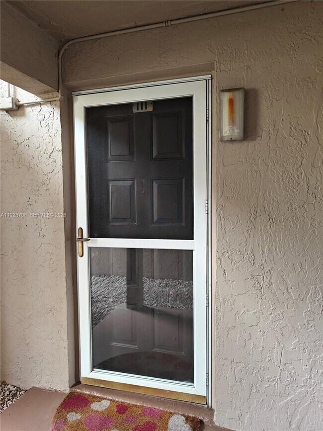 Building Photo - 8750 Royal Palm Blvd