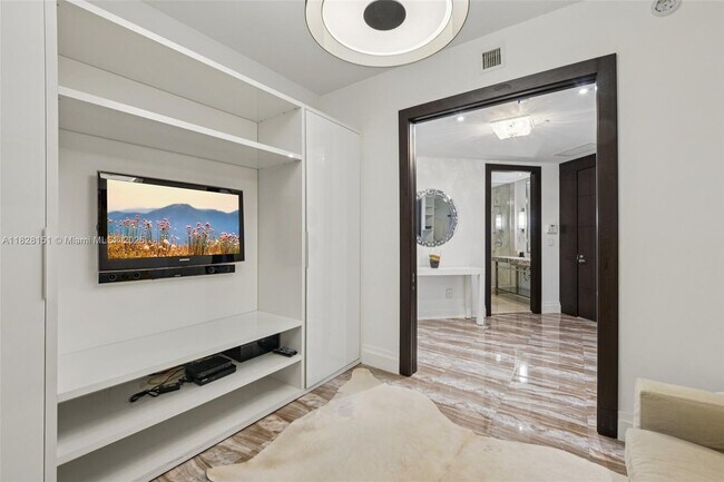 Building Photo - 9703 Collins Ave