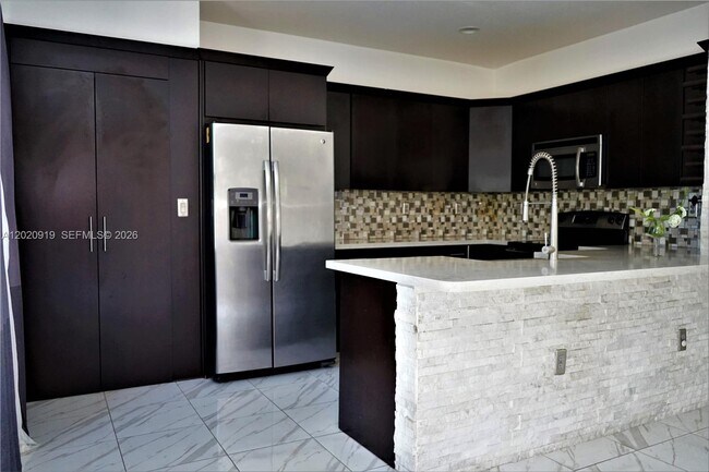 Building Photo - 3365 W 91st Terrace