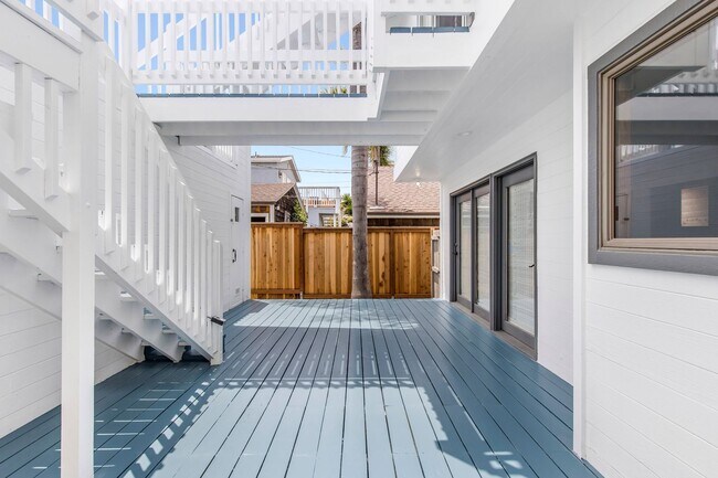 Building Photo - Modern Elegance Meets Ocean Breezes – Full Lot Sand Section Stunner