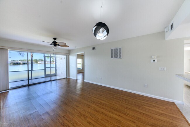 Building Photo - PRICE DROP!! UNFURNISHED ANNUAL RENTAL. CL...