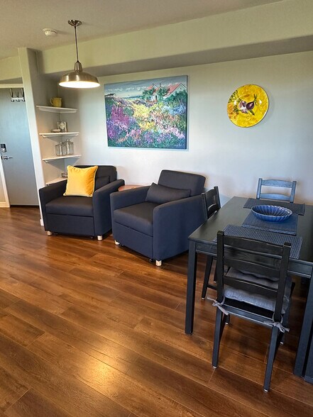 Sofa chairs open up to create twin beds. - 7079 Engineers Rd