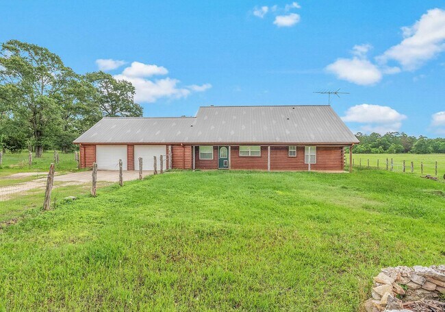 Building Photo - 10 acres with 3/2 cabin for rent in Navaso...