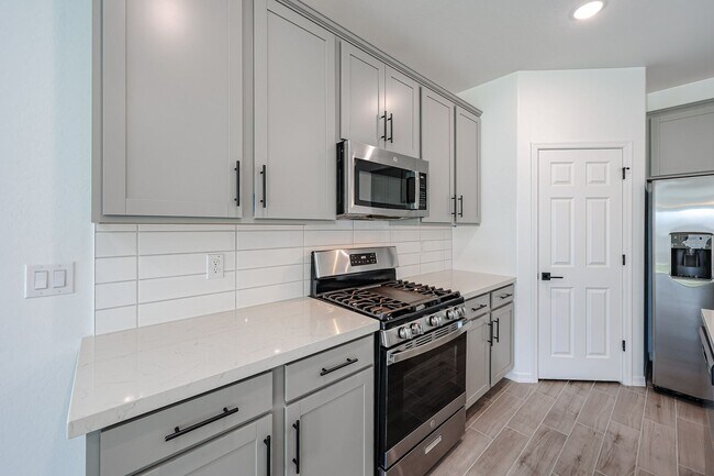Building Photo - Modern Mountainside Living: Stunning New 4-Bedroom Home in Estrella Crossing! 3 CAR GARAGE!