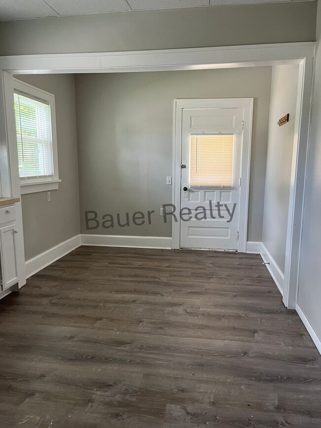 Building Photo - Three bedroom home with two car, detached garage!