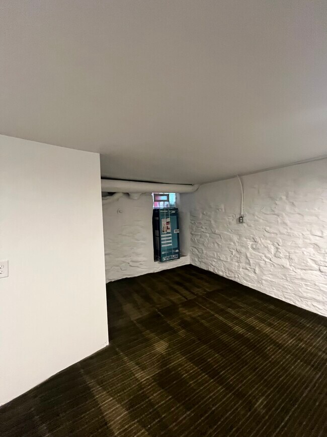 BASEMENT ROOM WITH REFRIGERATOR - 32 E Northwood Ave