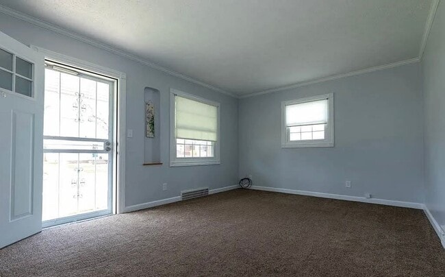 Building Photo - 5021 E 107th Updated 3/4 Bedroom