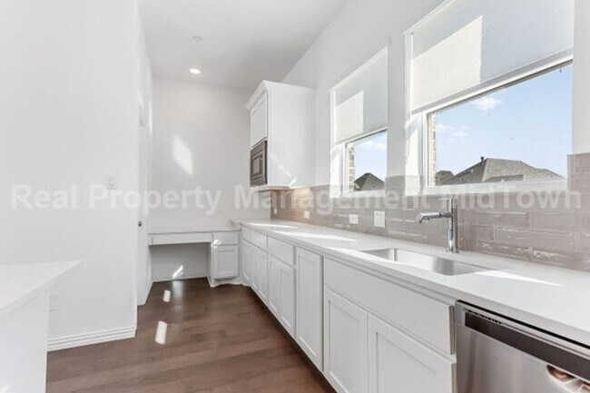 Building Photo - Live Elevated in the Heart of Viridian – S...