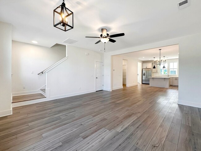 Building Photo - Beautiful, 3-Bedroom Midtown Nexton Townhome with Garage & Amenities