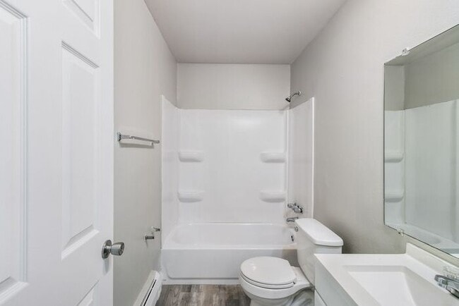 Building Photo - *Beautiful Apartment in Park Like Setting* Updated Shaker Cabinets and Appliances HEAT included