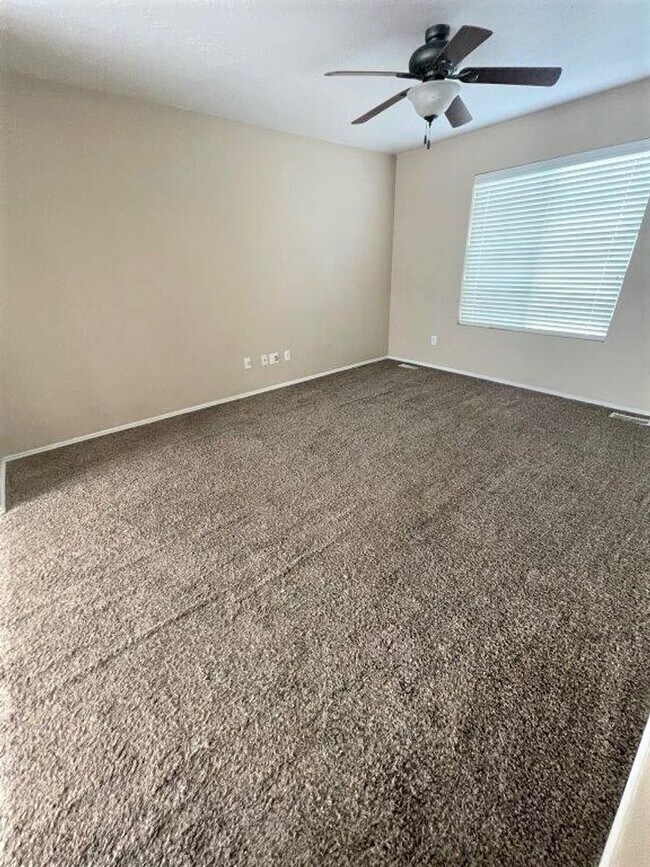 Building Photo - Move-In Ready 5-Bed with Garage, Yard & Up...