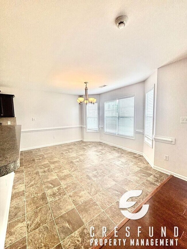 Building Photo - Freshly Painted and Spacious 4 Bedroom, 3 ...