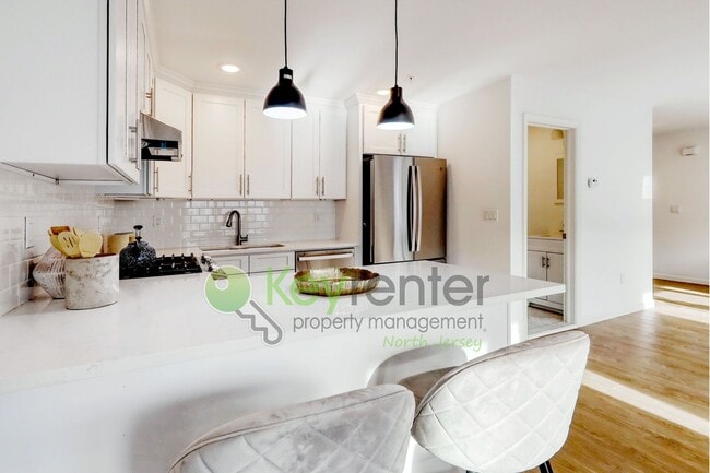 Building Photo - Modern New Construction 3 Bedroom Townhome with Garage & Driveway — First Occupancy!