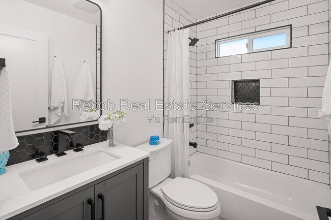 Building Photo - 4988 Genesee Ave