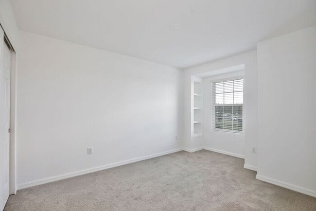 Building Photo - Luxurious 3/2.5 Modern Townhome with a Private Balcony and a 2 Car Garage in the Exclusive Gated ...