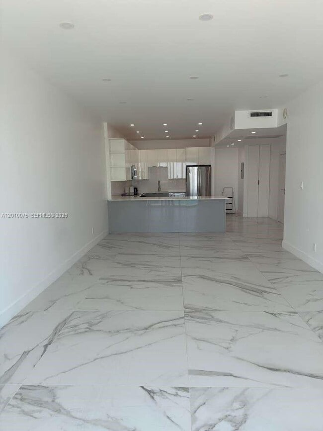 Building Photo - 19370 Collins Ave