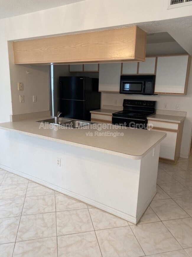 Building Photo - 8722 Rain Forest Pl