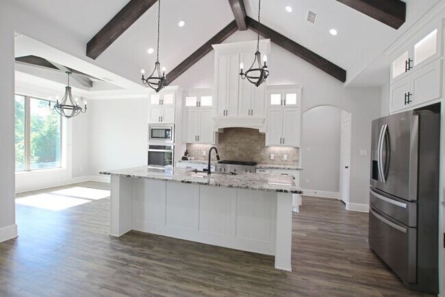 Building Photo - Tour Today! Beautiful 4-Bedroom, 2-Bathroom Home Overlooking a Pond!