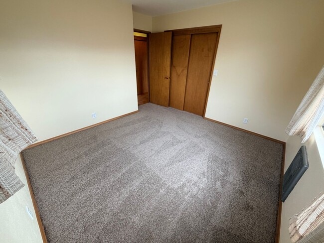 Building Photo - Country like setting! Spacious 3+ bed/ 1.5 bath house with garage, large yard, private deck and a...