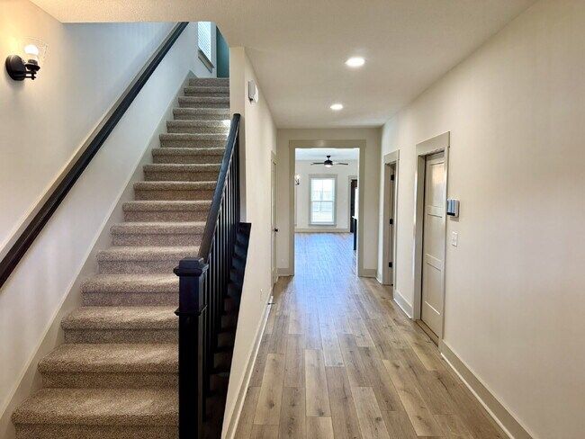 Building Photo - Need Space?  How about 5 bedrooms, 2.5 baths + an extra bonus area upstairs so that the kids can ...