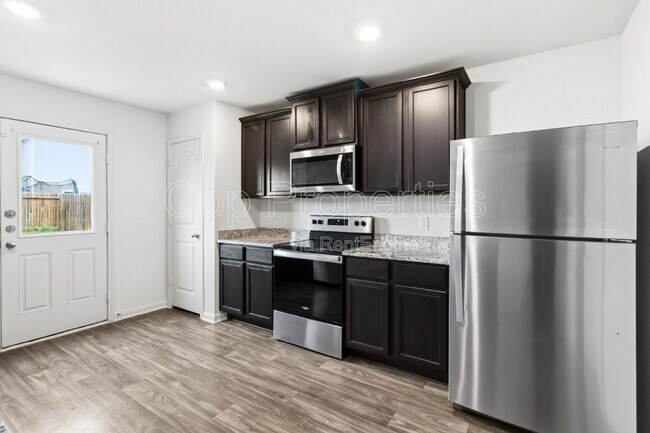 Building Photo - 7247 Calypso Cyn