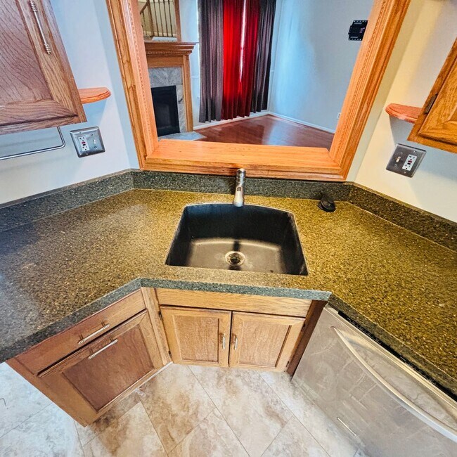 Building Photo - Spacious 3-Bedroom, 3-Bathroom Townhome with Finished Basement, Garage & Fenced Yard
