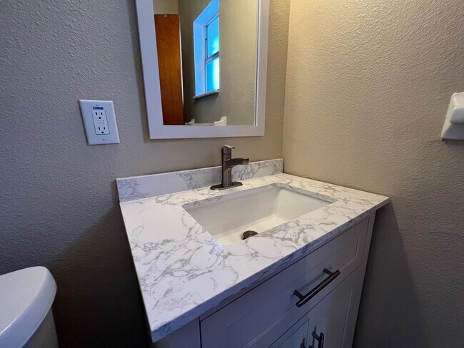 Building Photo - Newly Renovated 3/2 Home ~ Brand New Kitchen ~ Updated Bathrooms ~ Fenced Yard!