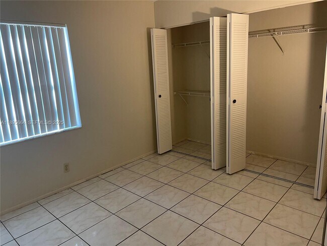 Building Photo - 10818 Royal Palm Blvd