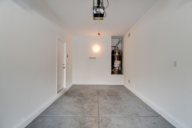 Building Photo - Great home with 4 bedrooms, 2.5 baths. New Floors Paint and Countertops.