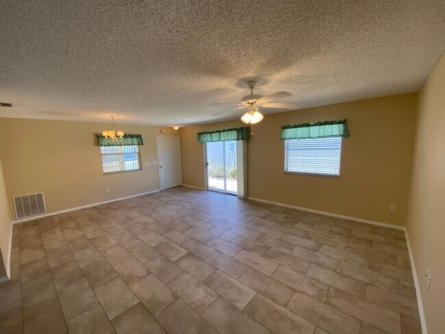 Building Photo - Charming Just Renovated Unfurnished ANNUAL LEASE - 2 Bedroom 2 Bath Patio Villa - Located In The ...