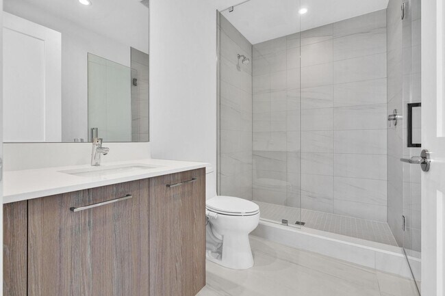 Building Photo - Stunning High-Rise Condo with Ocean Views | Prime Beach Location