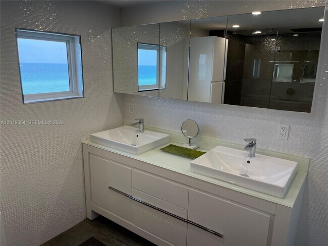 Building Photo - 8911 Collins Ave
