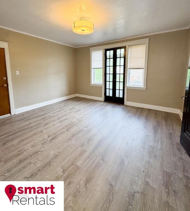 Building Photo - 7204 Zephyr Place - 2E