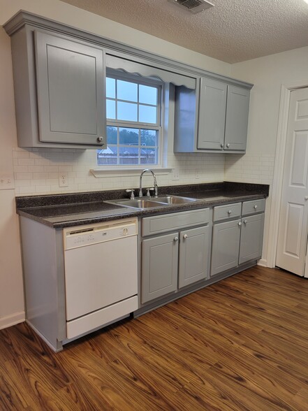 Lots of storage! Kitchen sink is equipped with a garbage disposal - 103 Pasofina Dr