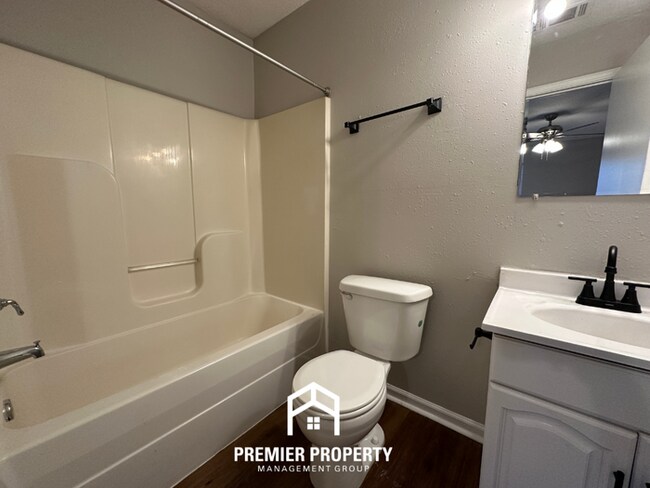 Building Photo - Spacious 4BR/2BA Home in 38141 | Vinyl Flooring & Large Fenced Backyard