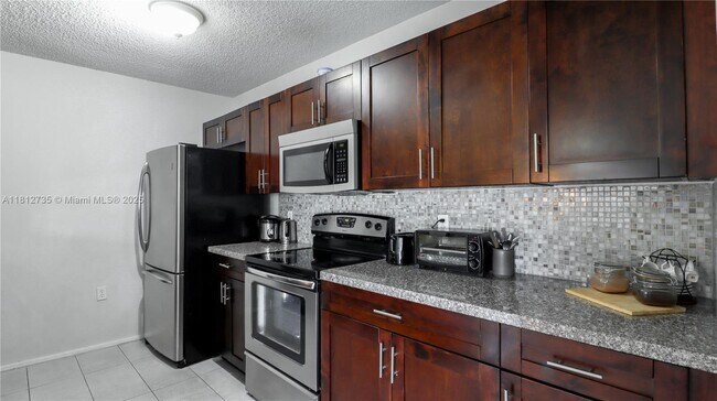 Building Photo - 10371 SW 150th Pl