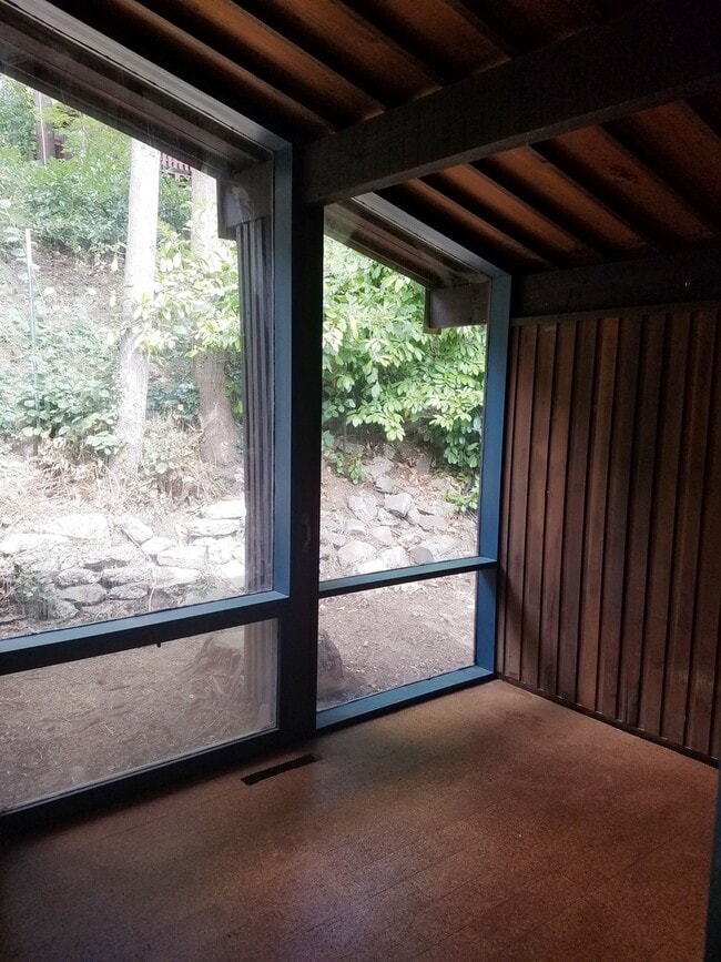 Building Photo - Unique Hillside Campus Home w/Floor to Ceiling Windows!!!