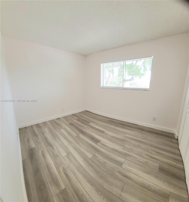 Building Photo - 8620 N Sherman Cir