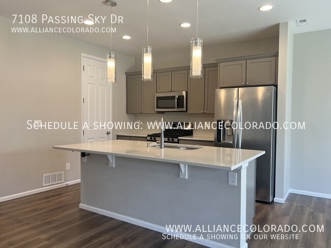 Building Photo - 7108 Passing Sky Dr