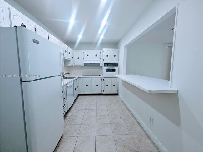 Building Photo - 19380 Collins Ave