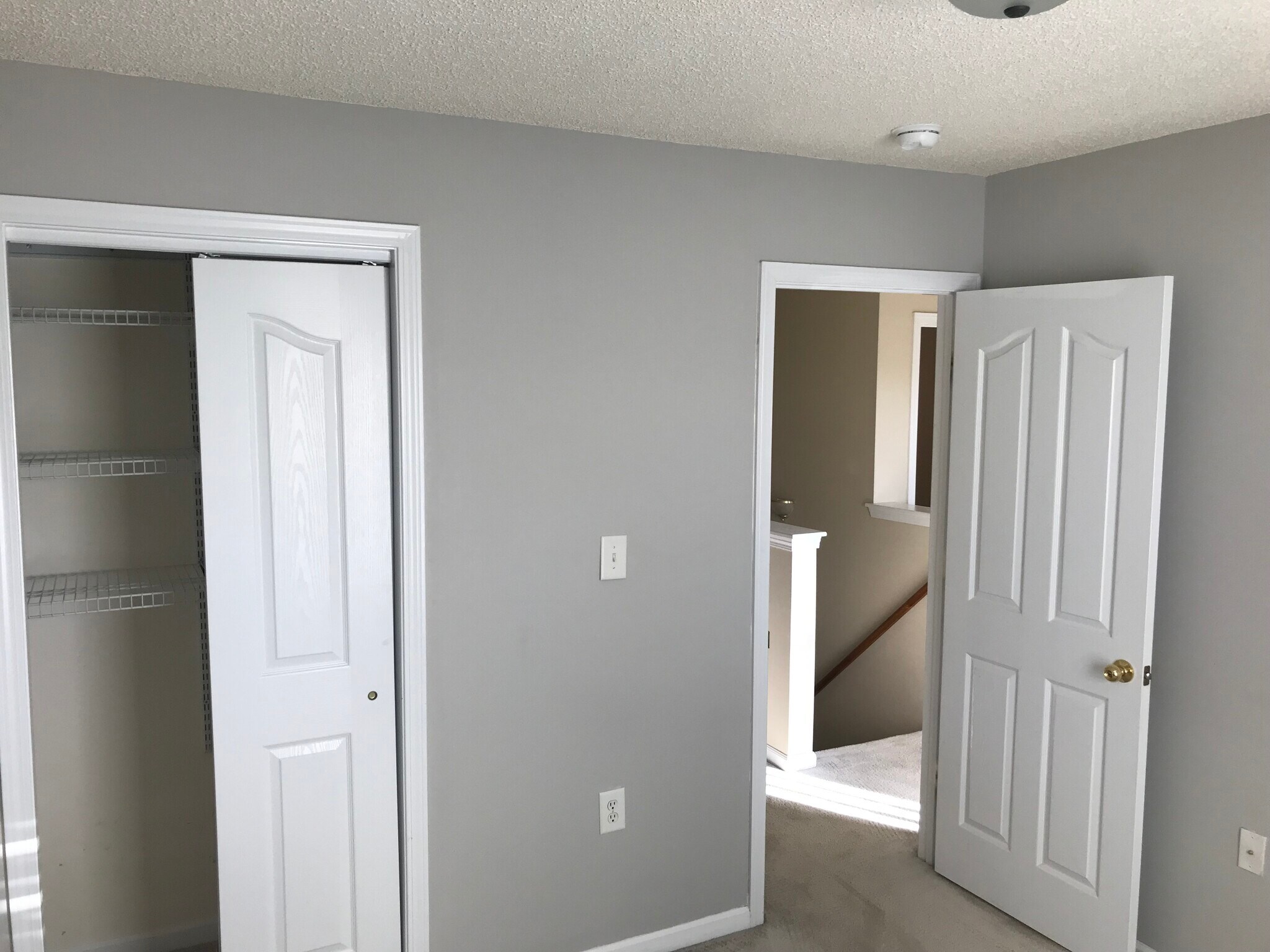 FIRST GUEST BEDROOM CLOSET AND ENTRY - 2808 Cougar Hill Ct