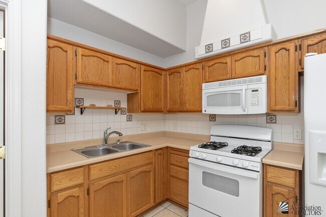 Building Photo - 9557 E 35th Pl