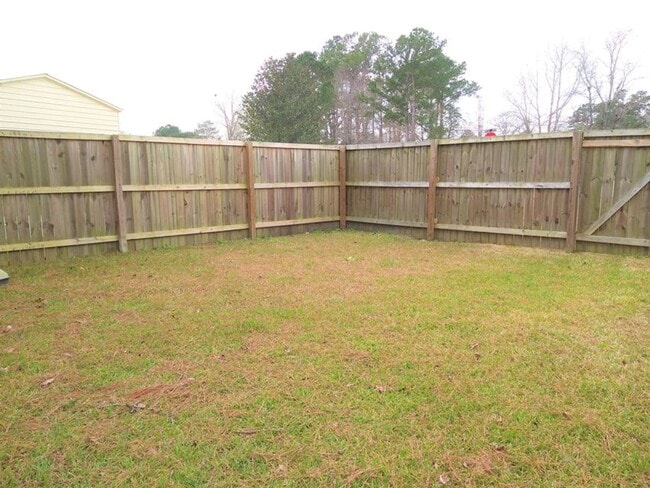 Building Photo - Cute, one story brick 3 Bedroom Brick Home