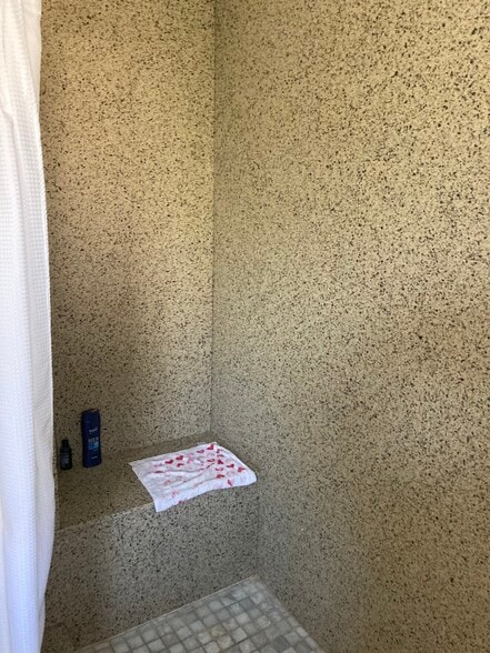 Seat in shower - 550 W 37th St